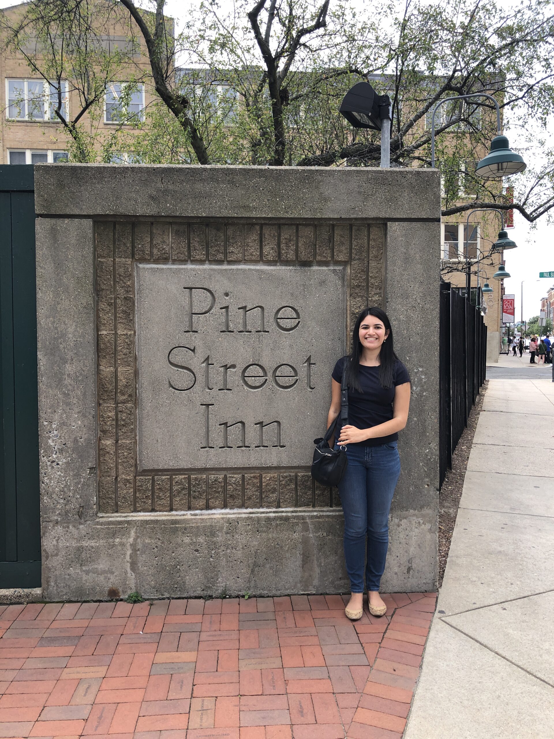 Sophia in front of Pine Street Inn