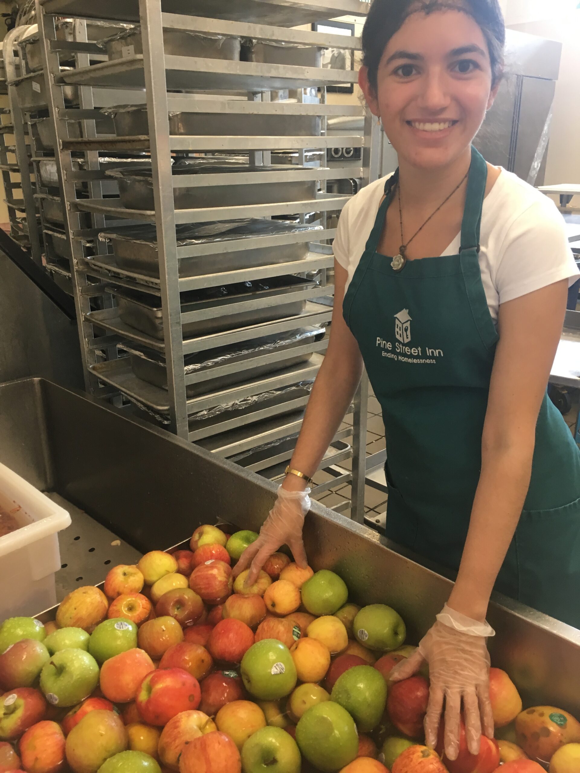 Sophia Mehta volunteering in the kitchen at Pine Street Inn